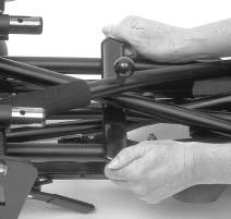 Push on seat tubes to complete fold. Fig.