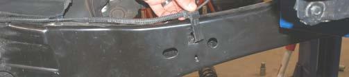 Remove the bracket from the frame rail.