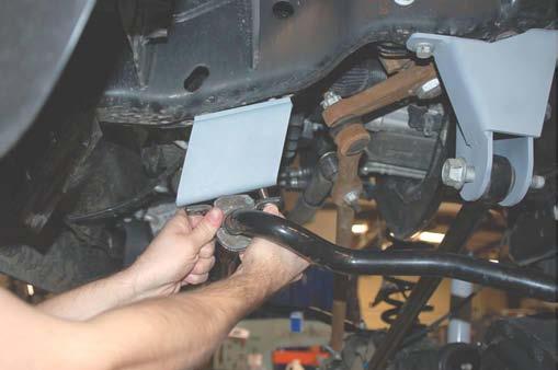 33. Install the sway bar drop bracket and stabilizer relocation bracket if reusing the factory
