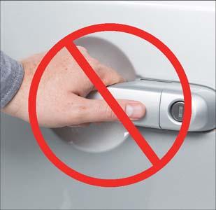 5 m) of the driver's or passenger front door handle, push the door handle button to lock all four doors and liftgate. Do NOT grab the door handle when pushing the door handle lock button.