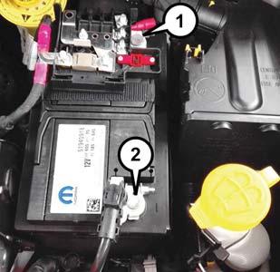 WHAT TO DO IN EMERGENCIES Preparations For Jump Start The battery in your vehicle is located in the front of the engine compartment, behind the left headlight assembly.
