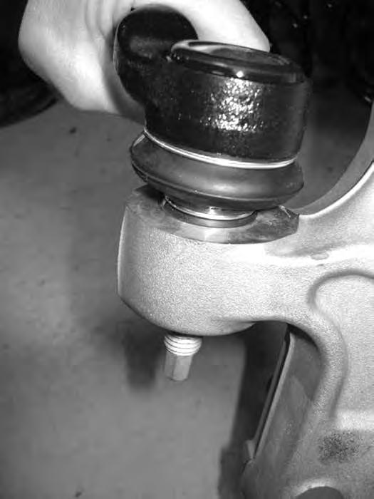 use appropriate tool to remove tie rod end from