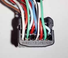 GREEN WIRES IN CONNECTOR E8. ENSURE CONNECTION IS MADE TO THE LARGER LT.