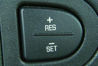 B A (On/Off): Press this button to turn the cruise control system on and off. 1. Lift the bar (A) under the front seat to unlock it. 2.