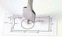 Bit or Spade Bit Miniature Files Wire Cutters Wire Strippers Heat gun Installation 1. Remove the tender shell by prying the sides of the shell outward and pulling up on the shell (Photo 1). Photo 2 2.