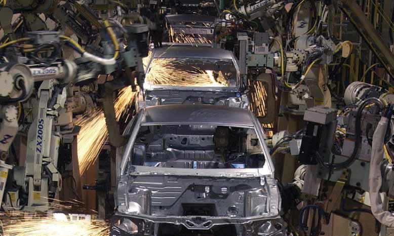 Photo courtesy Ford Motor Co. Motorized Vehicle Manufacturing Bodies in white undergo welding operations at the Ford Flat Rock Assembly Plant. Is an Automotive Tooling Capacity Gap Looming?