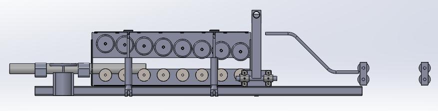 Design Concept II: Vertical separation between the die sets The pipe reel will