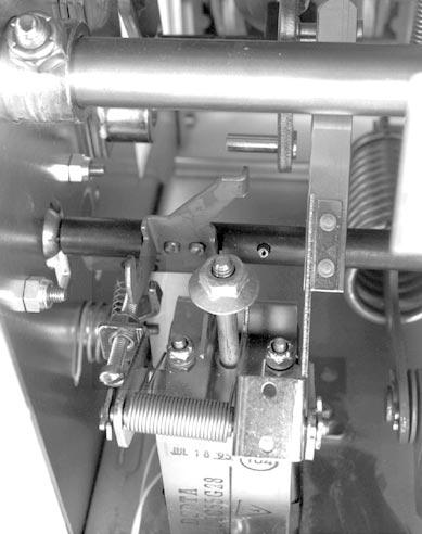 STEP 3: Remove and scrap the three (3) hex bolts from the bottom of the Breaker which secure the existing DTA assembly to the Breaker frame.