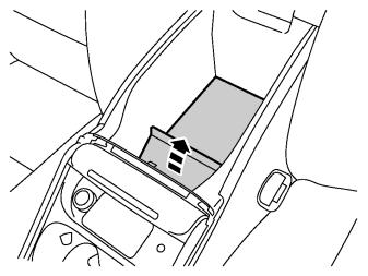 compartment by pulling it up at the front edge.