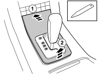 press the inner surround of the boot. Remove the panel. Applies to cars with automatic transmission Depress the catches and move the gear lever to D.