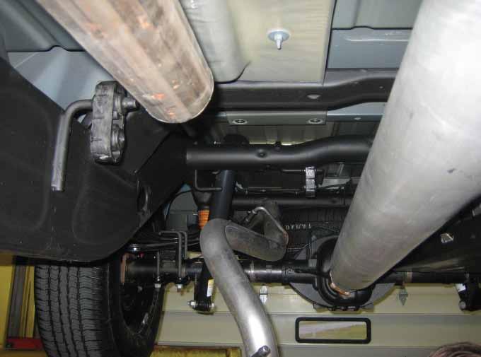 A) 2) Place a chain style cutter around the exhaust