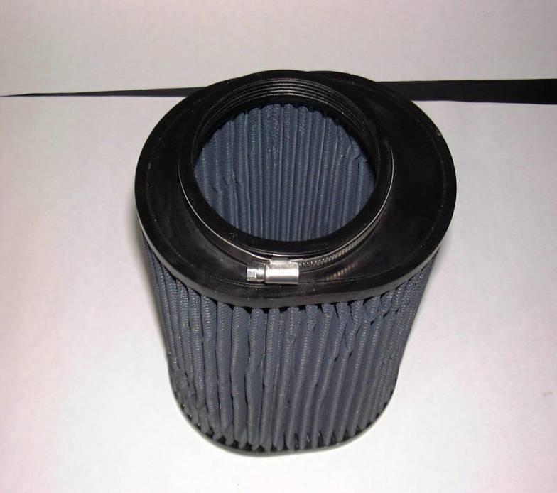 Install the filter in the box by placing the closed end of the filter in first, at an angle gently up against the headlight and rocking the open end down into the box.