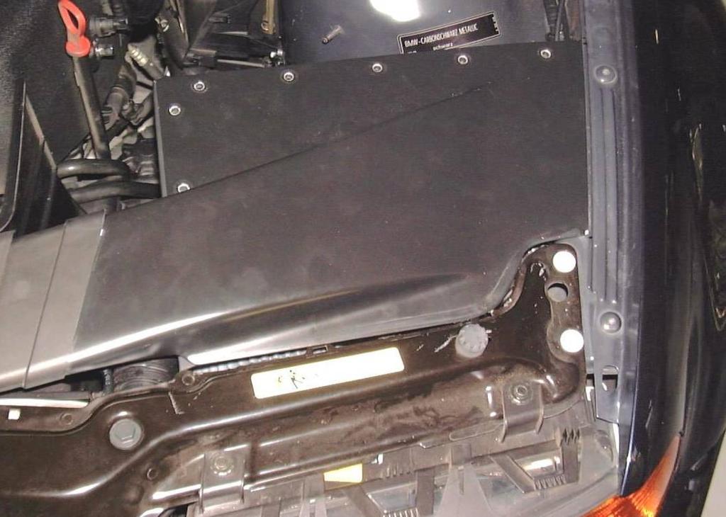 Fit the air box top and reinstall the upper air intake 44. Locate the new upper air box top and stock upper air intake.