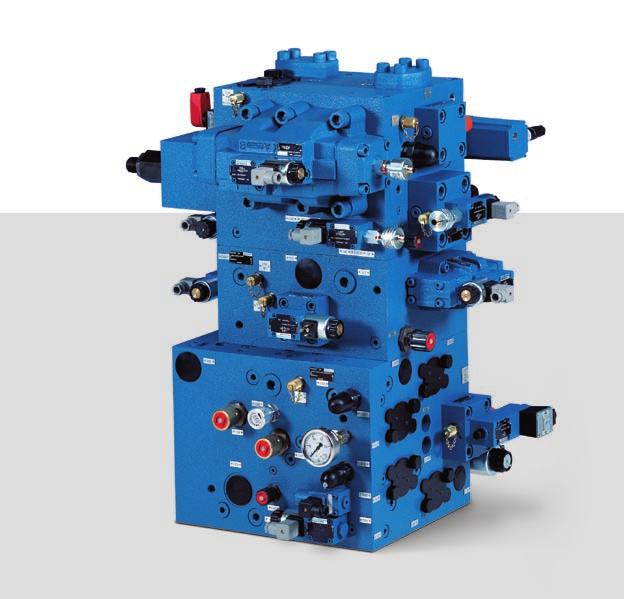 9 FN This customer-specific compact control system, consisting of three separate control blocks flanged together, is also designed to enable the blocks to be piped individually in the machine, thus