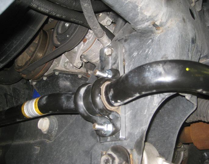 sway bar drop brackets as shown in the picture 26 and torque to 28