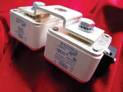 These fuses provide the electrical connection itself by a common contact part at both sides which simplifies the connection of copper-bars,