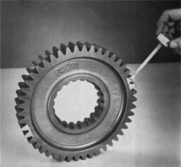 IMPORTANT: Mark any two adjacent teeth on deep reduction gear and repeat the procedure for the two adjacent
