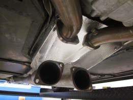 (Image 1) - Next remove the centre exhaust flange nuts, four (4) total. Pre soak the studs with an anti-seize lubricant.