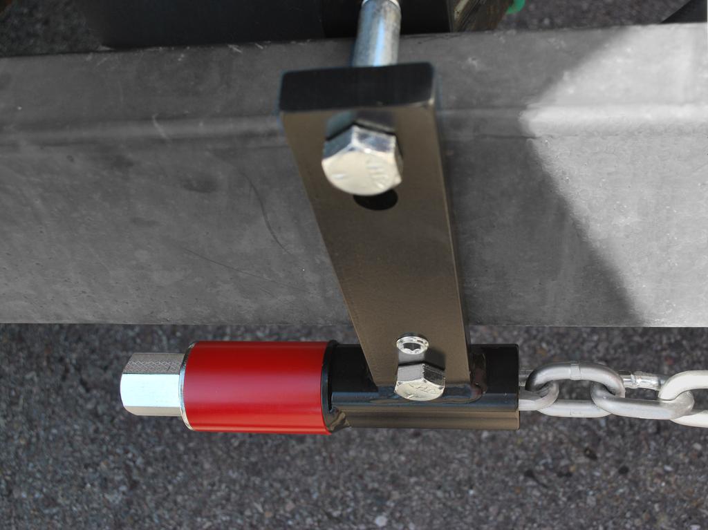 Take quick measurements along the trailer frame to make sure that the brackets on both sides are the same distance along the tongue (see diagram on left).