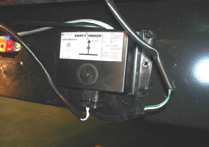 Tuck the wires inside the junction box and re-install the lid on the junction box.