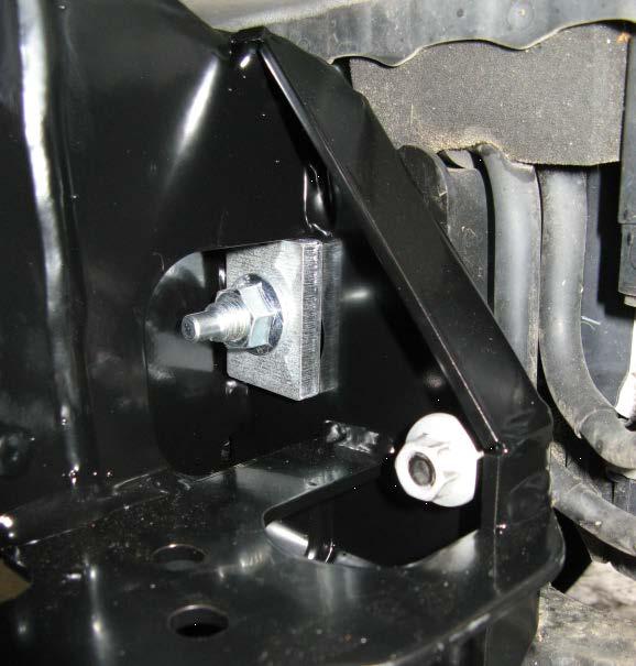 Install the chassis stud by fitting nuts to the end of the stud and tightening until