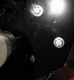 77. Using the M0 pilot holes in the mount brackets drill the two pinning holes through uprights