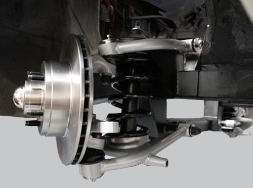 The lower ball joint is a MOOG K719 Pull the upper control arm down onto the spindle. Place the ball joint washer first and then the castle nut. Torque the upper ball joint to 70 ft.