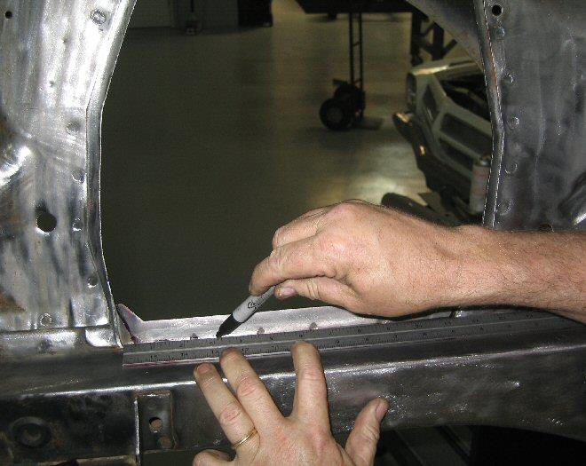 Remove excess material around the shock tower opening until it is flat to the new fender panel; Also: