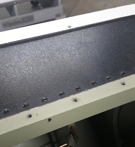 Approximately 26 rivets spaced 1 inch apart