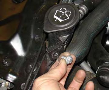 Figure 17 Remove the the m6 bolt from the radiator