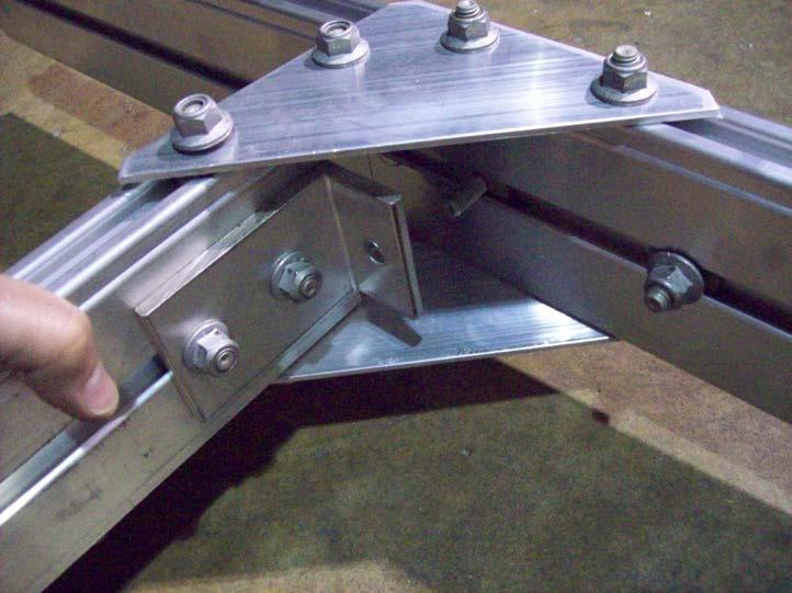 Insert the side rail into the T-bolts on the triangle plate