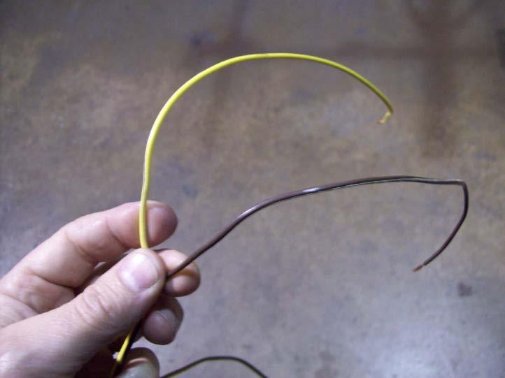 Take the left over wire from the harness that was cut off and separate the two wires.