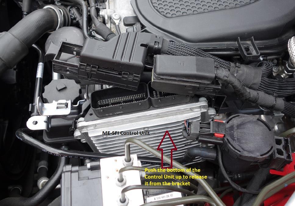 12. Push the M and F connectors wiring out of the way of the ME-SFI control unit towards the middle of the engine. 13.