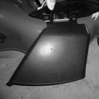 1. Lift the rear cover and remove the grass catcher. 2. Mount the Mulching wedge. 3. Lift the flap for side discharge. (Fig. 7A) 4.