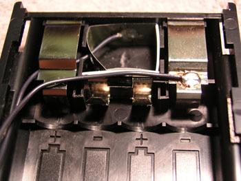 22 gauge wire onto the NEGATIVE terminal in the position shown.