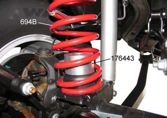 3) Install original insulator on top of coil spring 828B. Place bump stop spacer 176443 inside the coil spring. 4) Insert the spring assembly into the upper pocket and onto the axle pad.