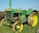 Horse drawn cultivators, seeders & parts. Large asst. of antique out board motors & chain saws. Large asst. of new & used tractor parts, magnetos, new John Deere Two cylinder heads etc.