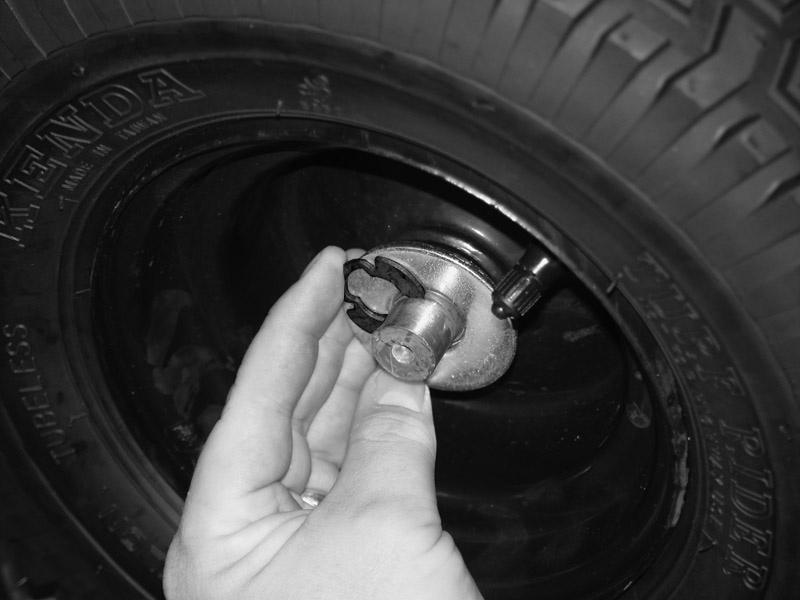 Grease the 3/4 shaft and slide on the Wheel assembly as shown in Figure 3. The valve stem should face out. Step 4. Place the 3/4 I.D.