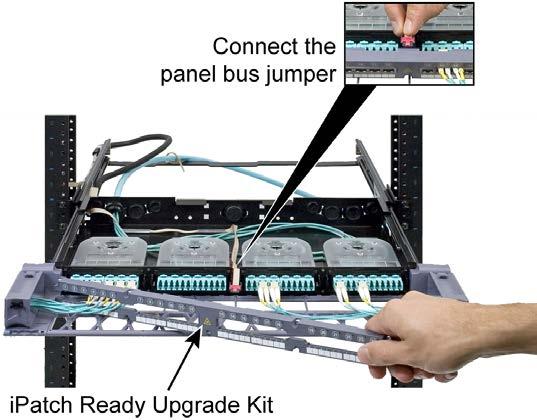 860463090 Instruction Sheet 10. If the shelf is a fixed shelf, feed the excess panel bus jumper into the shelf as shown.