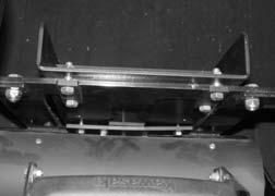 Use two bar clamps on top portion of plate, fastening from in front of bumper bar, with four 3/8-16 x 1-1/4 hex bolts and serrated flange nuts.