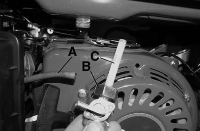 To replace or clean spark plug; 1) Dismantle the spark plug cap (A) Fig.9 by pulling it off the spark plug (B).