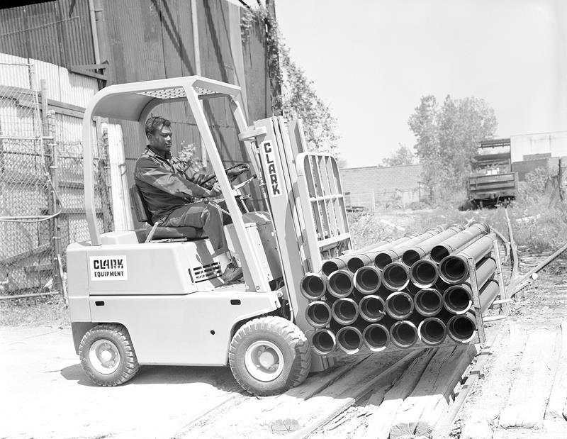 1964 CLARK is the first lift truck manufacturer to install load back rests and overhead guards as standard