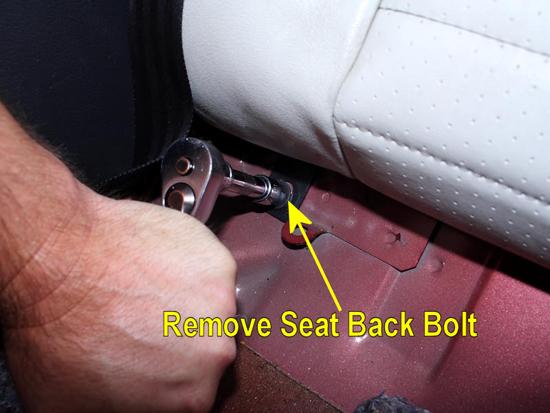 Use a 10mm socket (99-02), 18mm (03-04), to remove the seat back bolts.