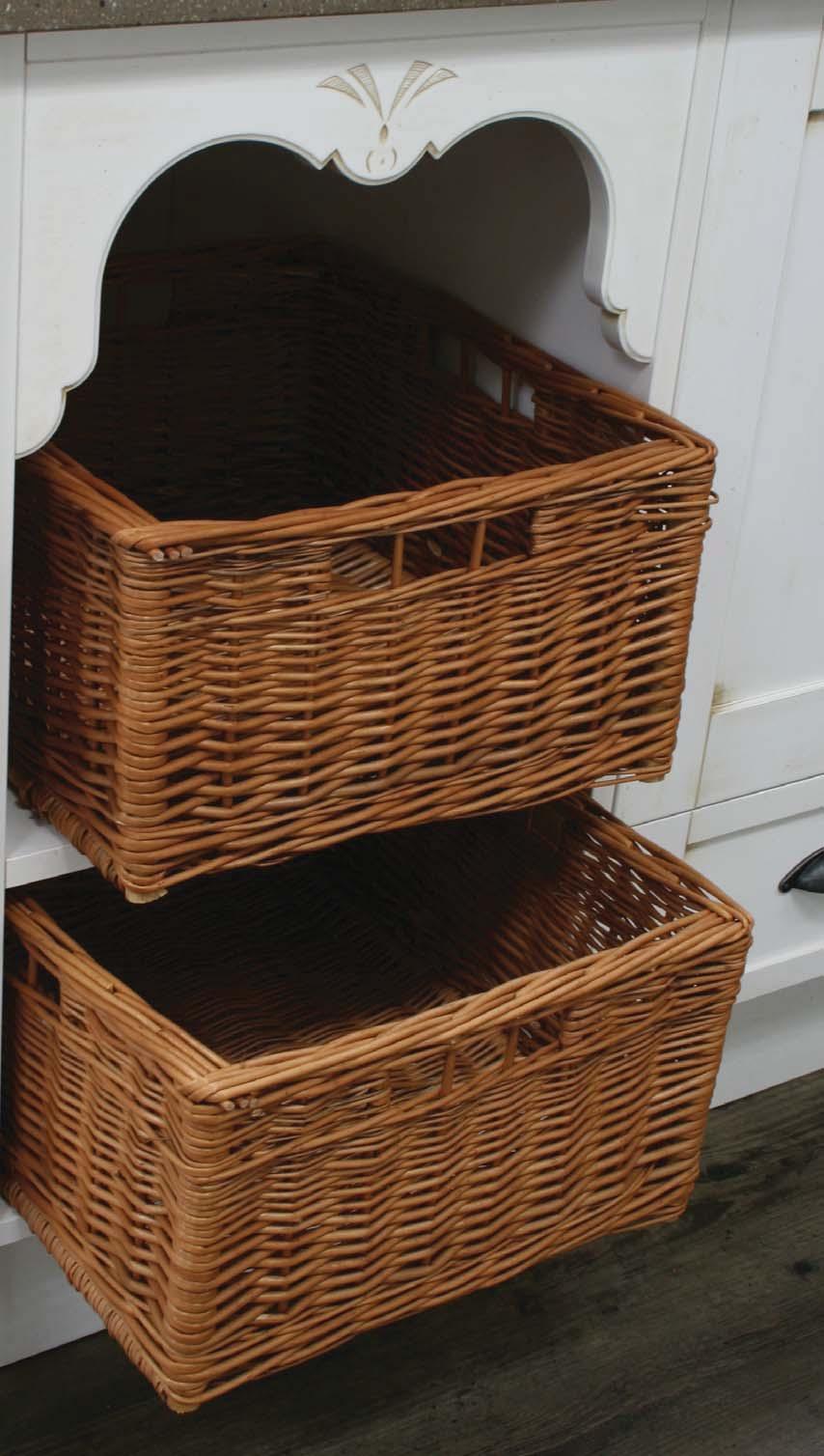 WICKER BASKET With four handle holes.