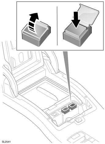 If an under floor fire is sensed, the under floor system must be manually operated by pressing the red firing button, located in the front centre storage compartment.