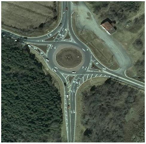 Roundabout Circular traffic patterns in which yield control is used on all entries, circulating vehicles have the rightof-way, pedestrian access is allowed only across the legs of the roundabout