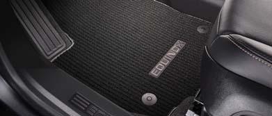 Integrated Cargo Liner in Black with Equinox Logo covers the cargo area floor and the back of the rear