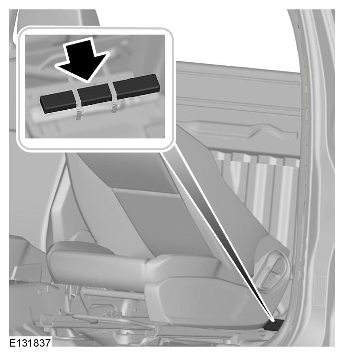 WARNING TRIANGLE Single cab A retaining strap behind the passenger seat can be used to secure a