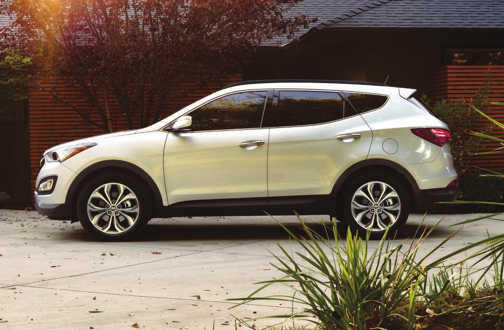 RUGGED ELEGANCE A sleek belt line, powerful wheel arches, and smooth character lines of the rear spoiler drive the bold and dynamic profile of the 2015 Santa Fe Sport.