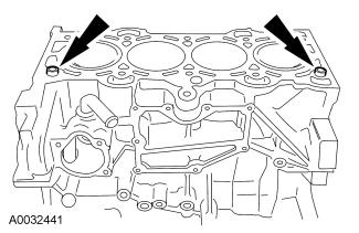 Remove the cylinder head alignment dowels. 61. NOTICE: Do not use metal scrapers, wire brushes, power abrasive discs or other abrasive means to clean the sealing surfaces.